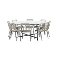Ronde tuintafel met acht stoelen van wicker en staal