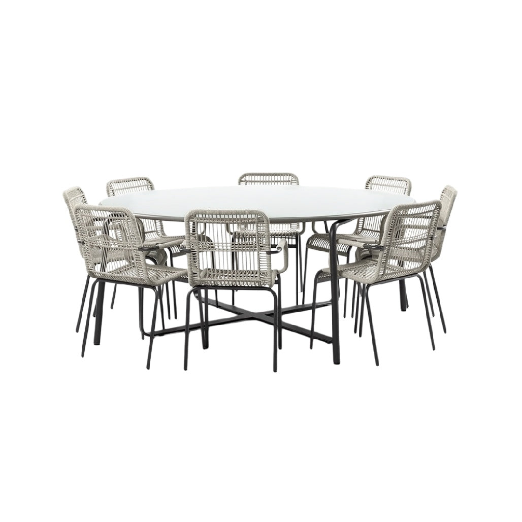 Ronde tuintafel met acht stoelen van wicker en staal